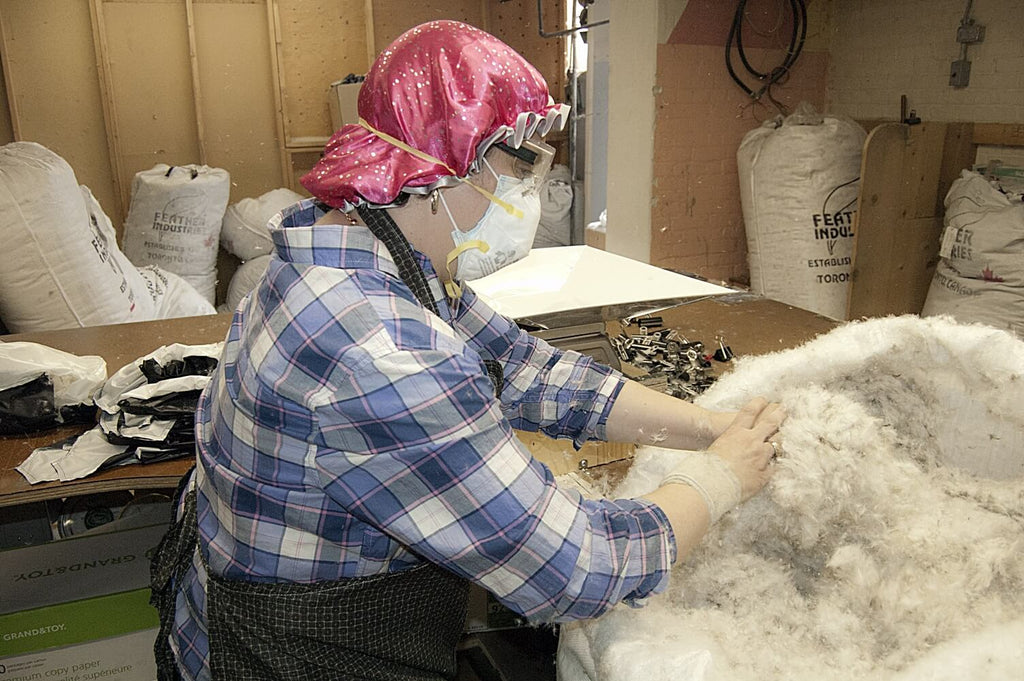 Down insulation station used in Arctic Bay winter parka manufacturing