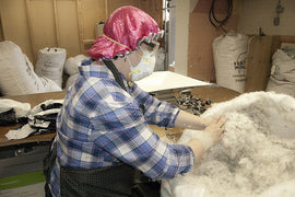 Down insulation station used in Arctic Bay winter parka manufacturing